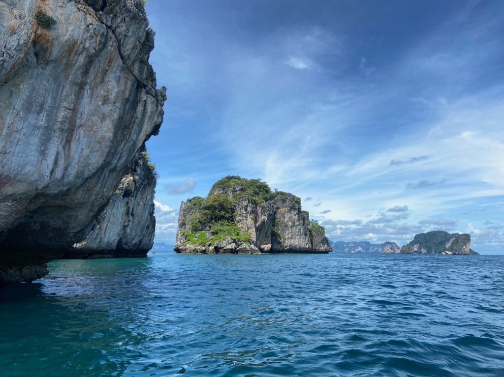 Masses of limestone cliffs erupting out of the sea